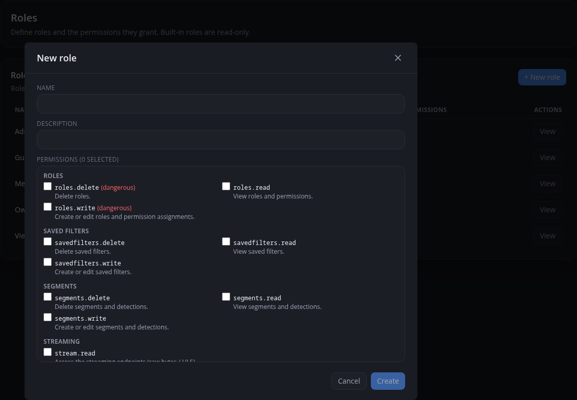 New role form showing role, saved-filter, segment, and streaming permission choices